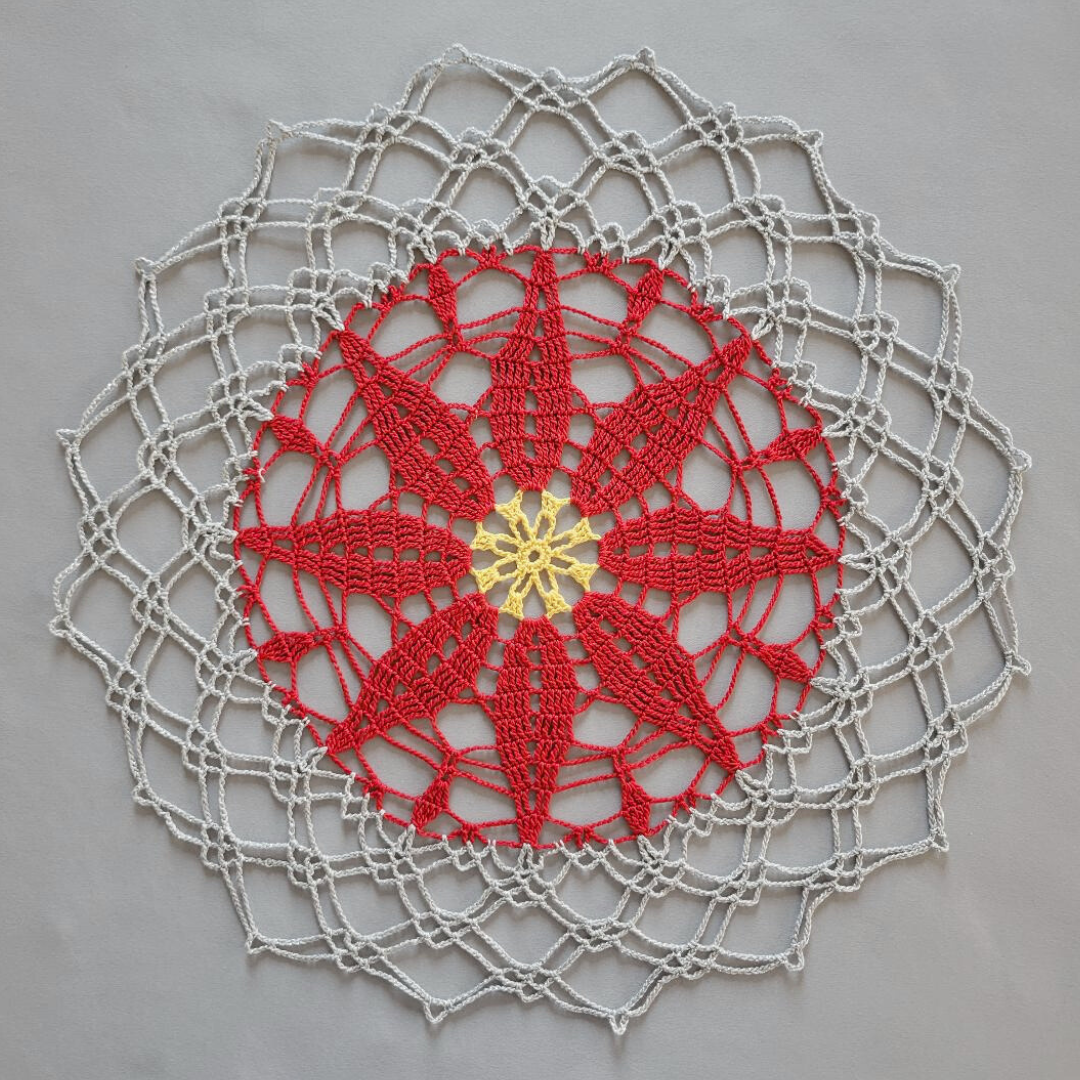 White Poinsettia 16 1/2" Doily on Silver