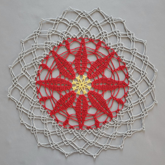White Poinsettia 16 1/2" Doily on Silver