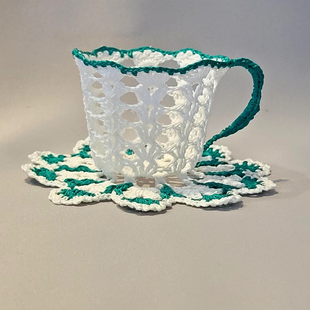 White Teacup with Teal Trim