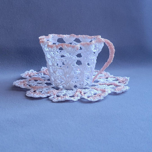 White Lacy Teacup with Peach Trim